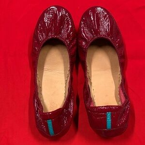 These are Tieks by Gavrieli Ruby Red Patent Ballet Flats